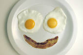 breakfast eggs with sausage happy face